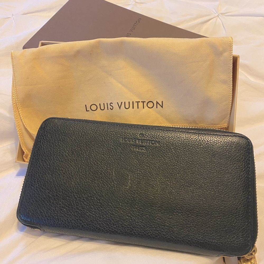 Black LV wallet with zipper and perfect card slots!! Gently used.😊